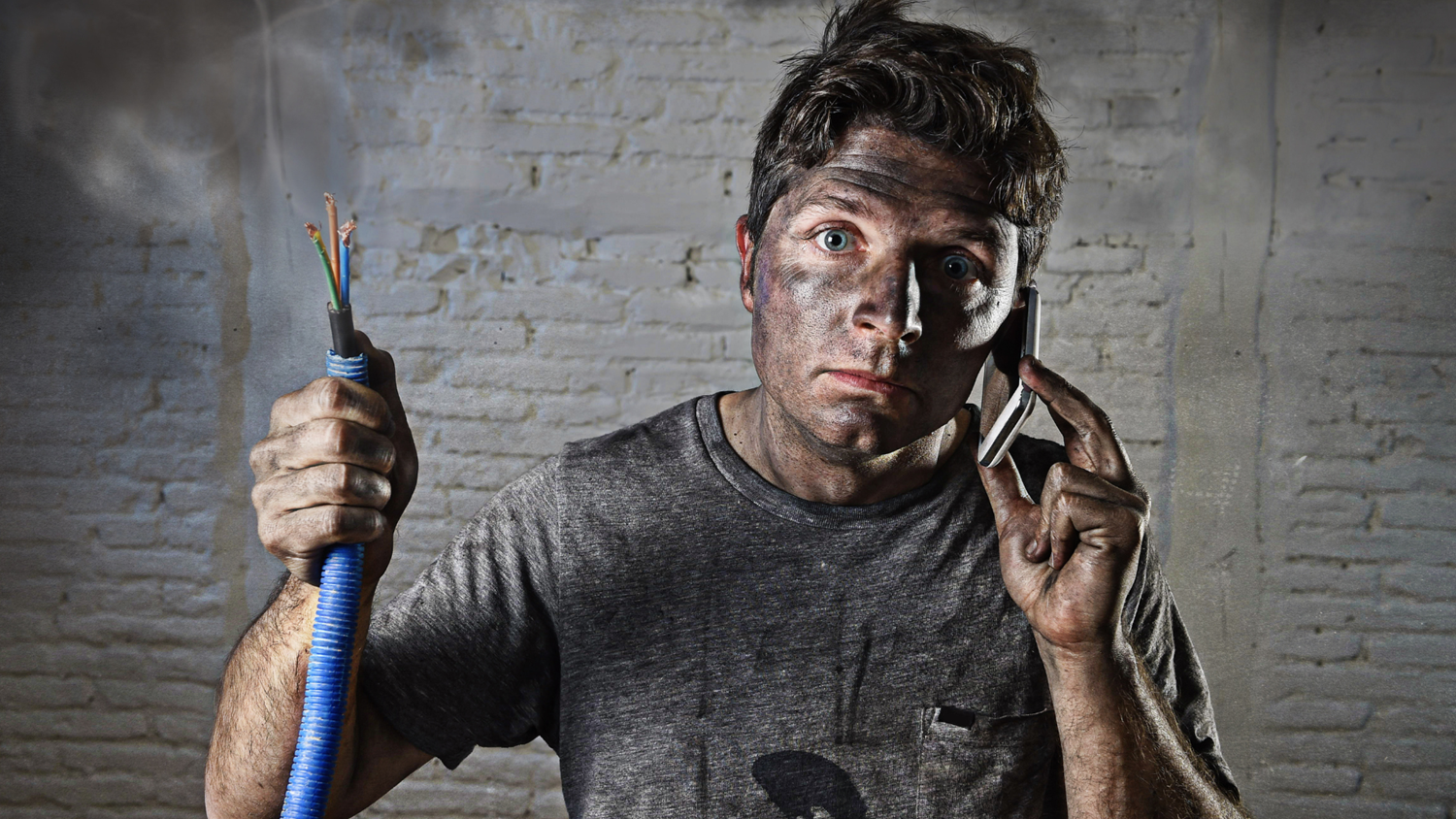 An image to show a man that has been shocked due to bad home DIY electrics