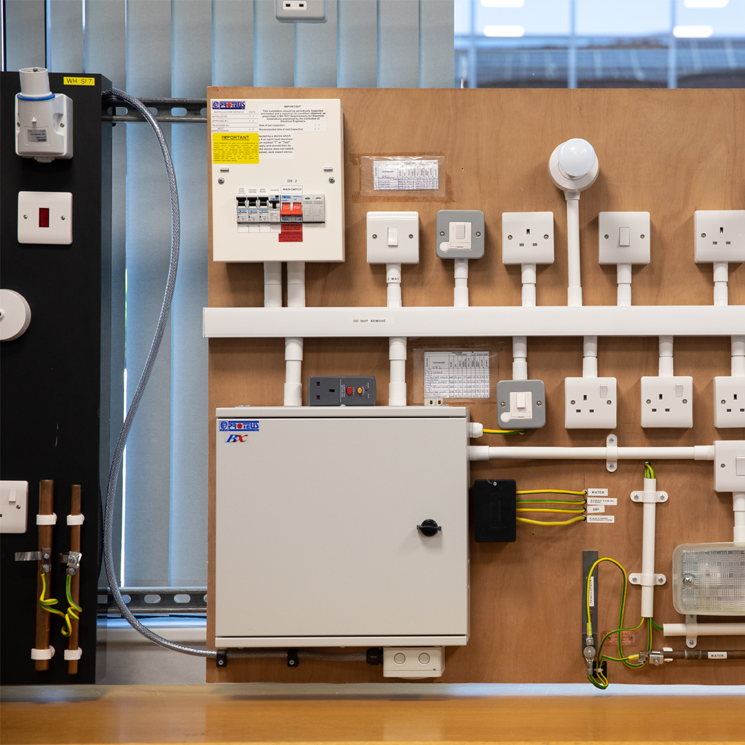 NICEIC training board, consumer unit, plugs and lighs